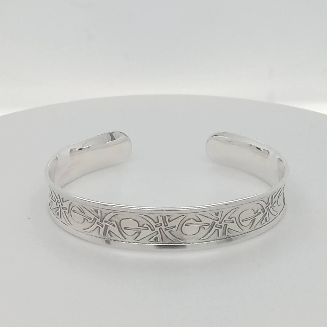 Sterling Silver bracelet 92.5 etched pattern XOXO Hugs & Kisses handformed with an open back GemRapture Jewellery handmade artisan jewelry Canada