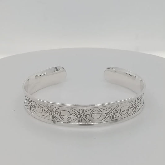 Sterling Silver bracelet 92.5 etched pattern XOXO Hugs & Kisses handformed with an open back GemRapture Jewellery handmade artisan jewelry Canada