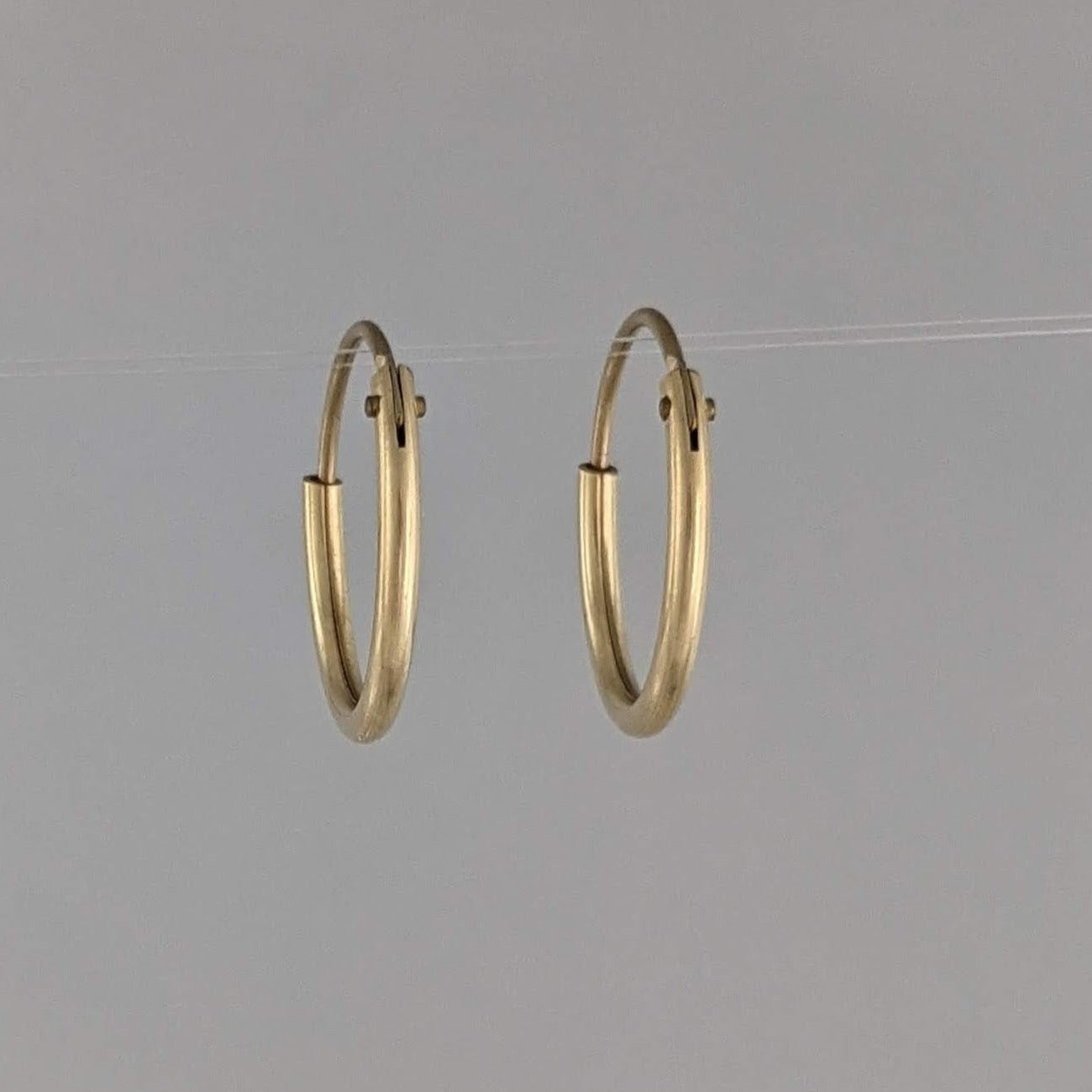 Machine fabricated hinged hoop earrings 14/20 Gold-filled 15mm hollow tube lightweight economical GemRapture Jewellery