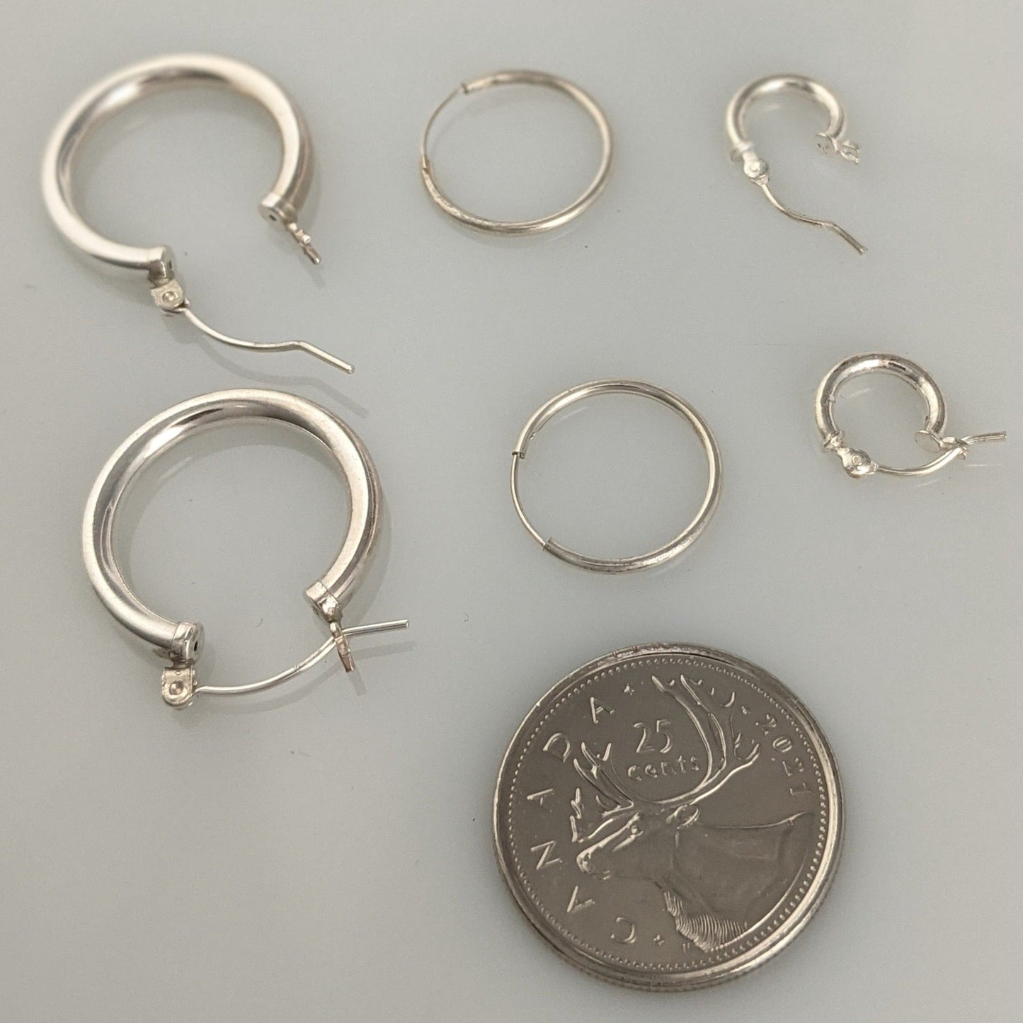 Machine fabricated hinged hoop earrings sterling silver 22mm hollow tube lightweight economical GemRapture Jewellery