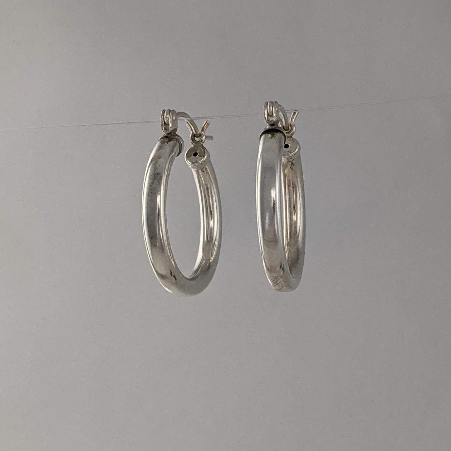 Machine fabricated hinged hoop earrings sterling silver 22mm hollow tube lightweight economical GemRapture Jewellery